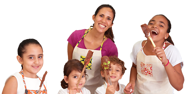 Malu Petty e crianças cozinhando